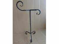 Old forged candlestick, candle, candelabra, wrought iron
