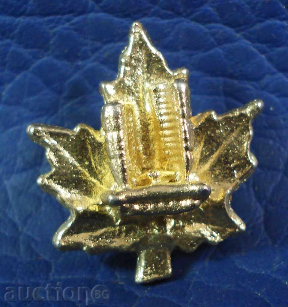 3320 Canada logo with Canadian coat of arms maple leaf on pin