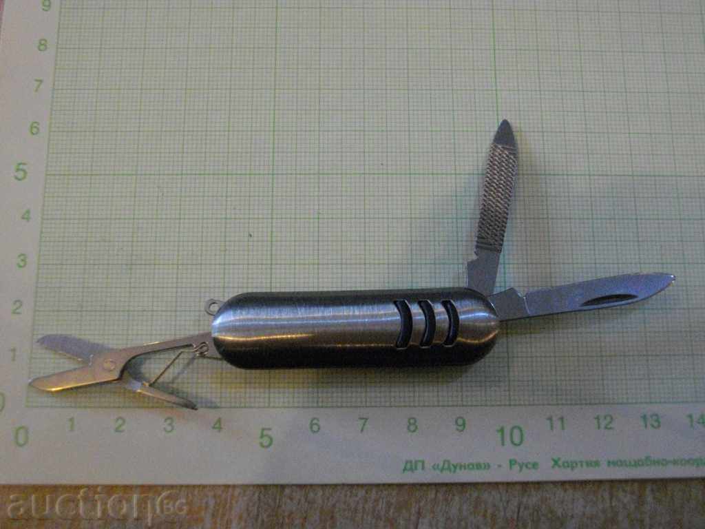 Knife small with scissors and metal tines with price 6.00 BGN | € 3.07