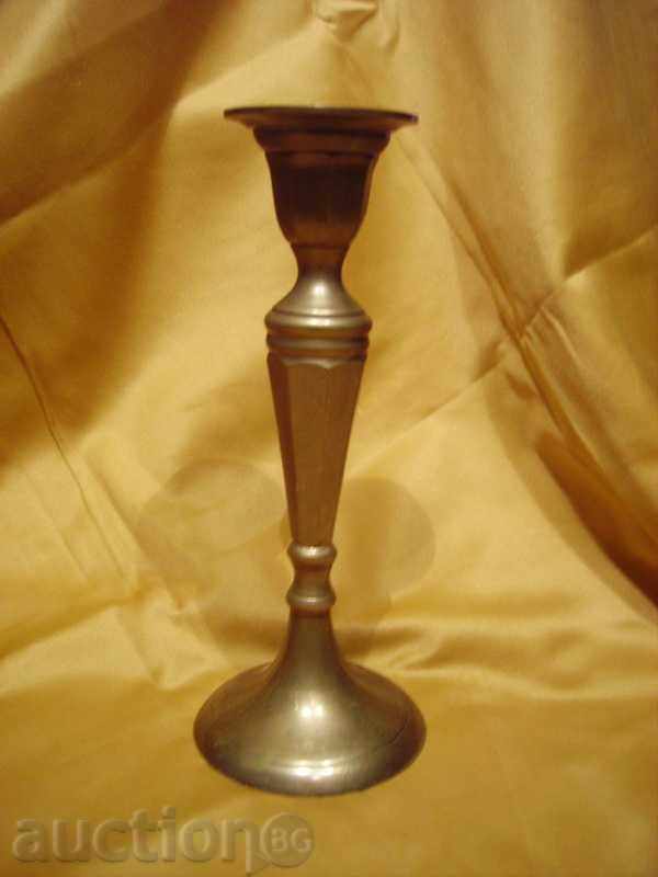 Auction  Old bronze candlestick