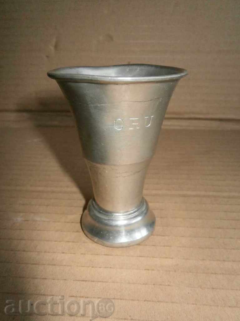 Auction a glass of white metal Auction a glass of white metal