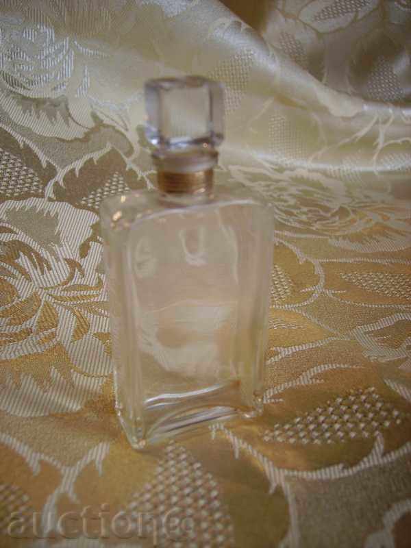 An ancient crystalline bottle of perfume