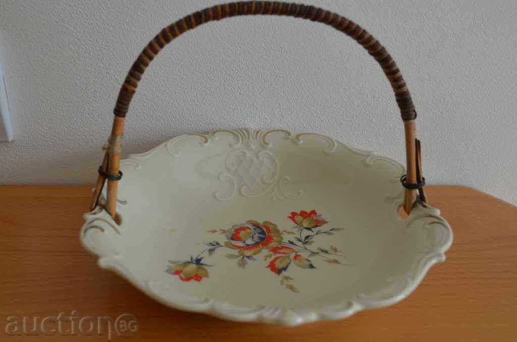 Decorative porcelain fruit bowl with handle
