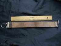 An old professional razor blade sharpening binder.