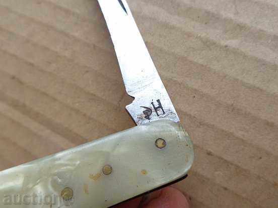 Auction  Old knife, opener, corkscrew, knife