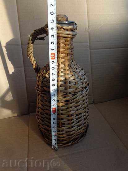 Delivery of An old blowing damagan with braid, bottle, glass Delivery of An old blowing damagan with braid, bottle, glass