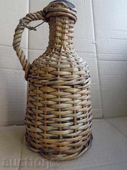 An old blowing damagan with braid, bottle, glass