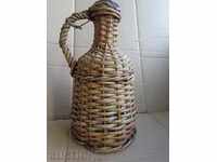 An old blowing damagan with braid, bottle, glass