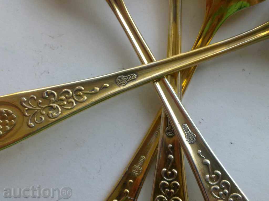 Auction 4 pcs of golden teaspoons Auction 4 pcs of golden teaspoons