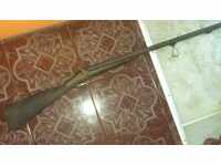 Veche pușcă cu încărcare pe țeavă, cu două țevi