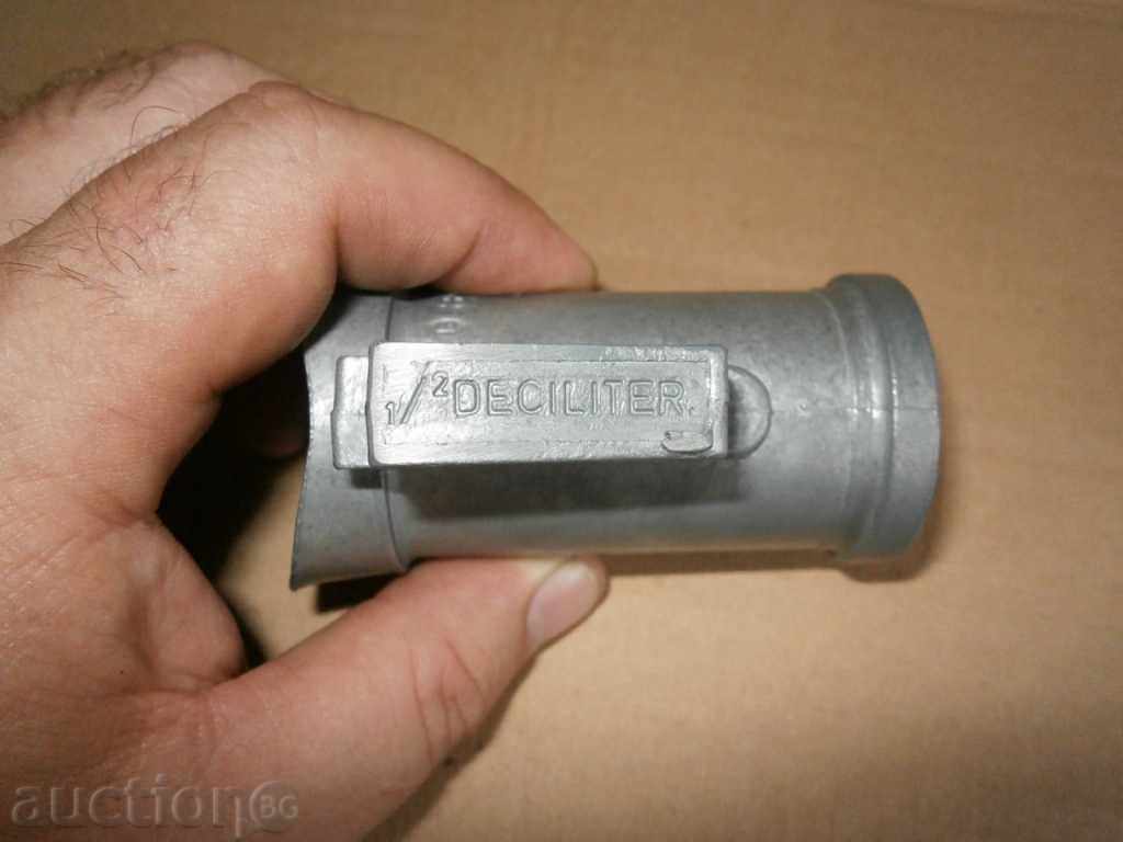 Delivery of antique tin cup measure for alcohol decile Delivery of antique tin cup measure for alcohol decile