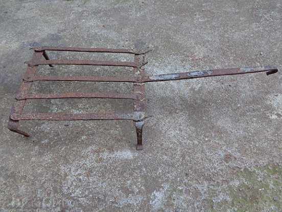 Old metal grill, wrought iron