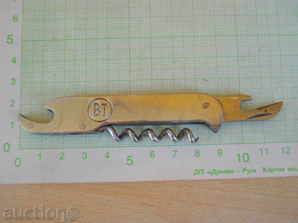 Delivery of "VT" opener with a corkscrew from a sucker Delivery of "VT" opener with a corkscrew from a sucker