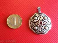 Interesting Silver Pendant