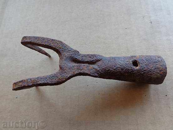 Delivery of Old manual forged tool, cottage, hammered hook forged iron Delivery of Old manual forged tool, cottage, hammered hook forged iron