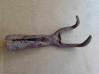 Old manual forged tool, cottage, hammered hook forged iron