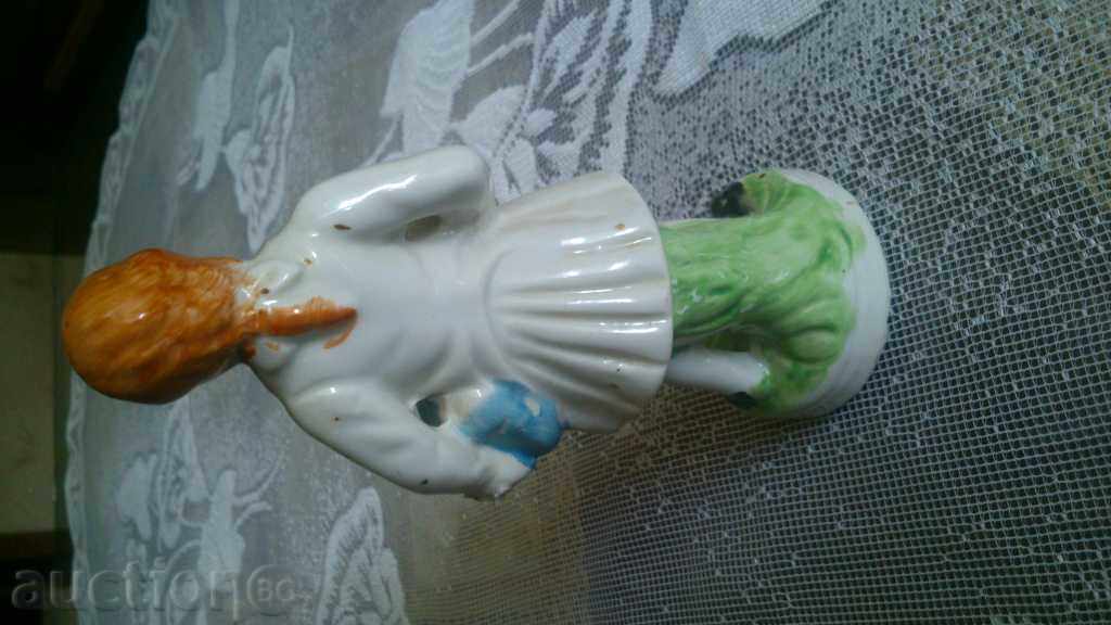 Auction  Porcelain figure