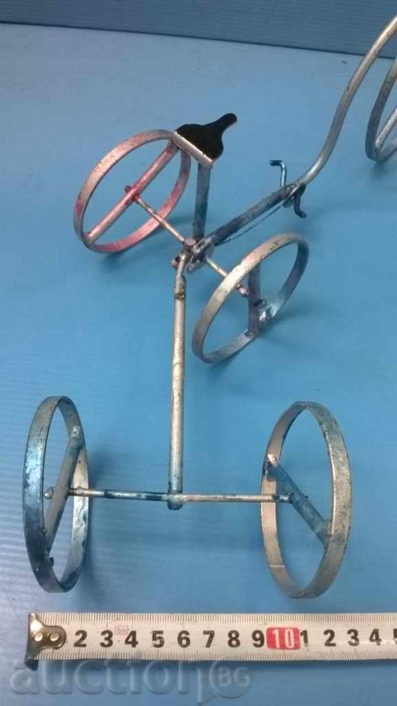 Auction an interesting wheel, a tricycle with a trailer Auction an interesting wheel, a tricycle with a trailer