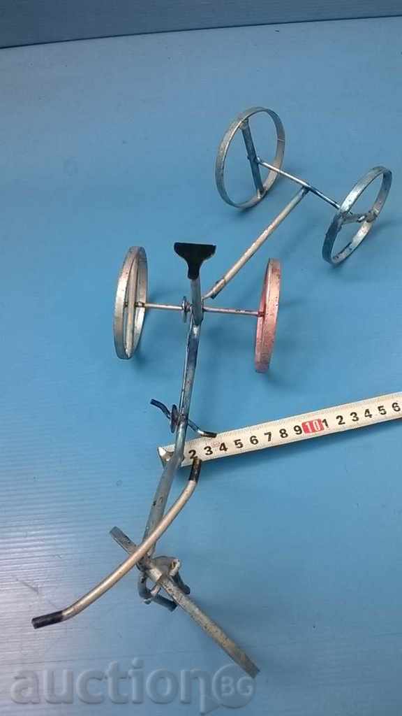 Delivery of an interesting wheel, a tricycle with a trailer Delivery of an interesting wheel, a tricycle with a trailer