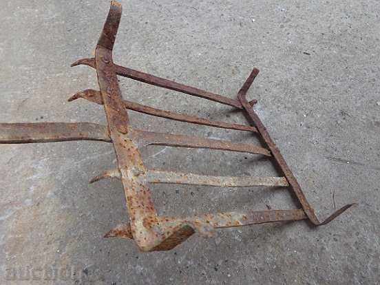 Auction An old hand-forged grill, a steak, wrought iron Auction An old hand-forged grill, a steak, wrought iron