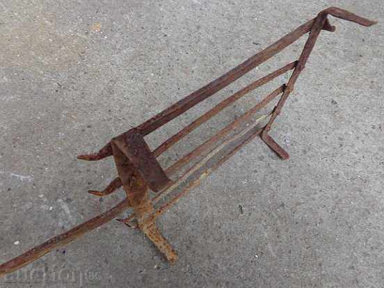 Delivery of An old hand-forged grill, a steak, wrought iron Delivery of An old hand-forged grill, a steak, wrought iron