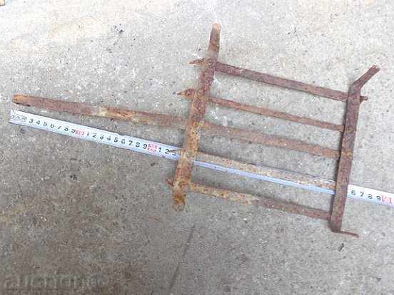 An old hand-forged grill, a steak, wrought iron - 5 An old hand-forged grill, a steak, wrought iron - 5