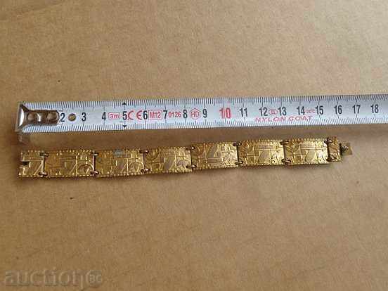 Delivery of Renaissance bronze bracelet with gilded jewel, ornament Delivery of Renaissance bronze bracelet with gilded jewel, ornament