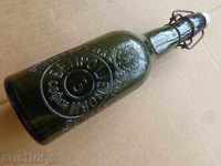 An old beer bottle for a beer bottle with a plug