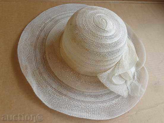 Delivery of Branded ladies hat, capel, bombe