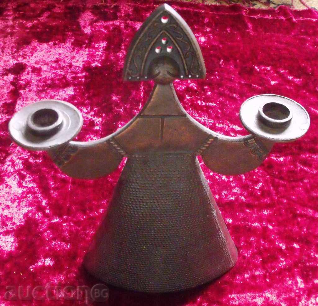 an old metal candleholder with price 49.00 BGN | € 25.05 an old metal candleholder with price 49.00 BGN | € 25.05