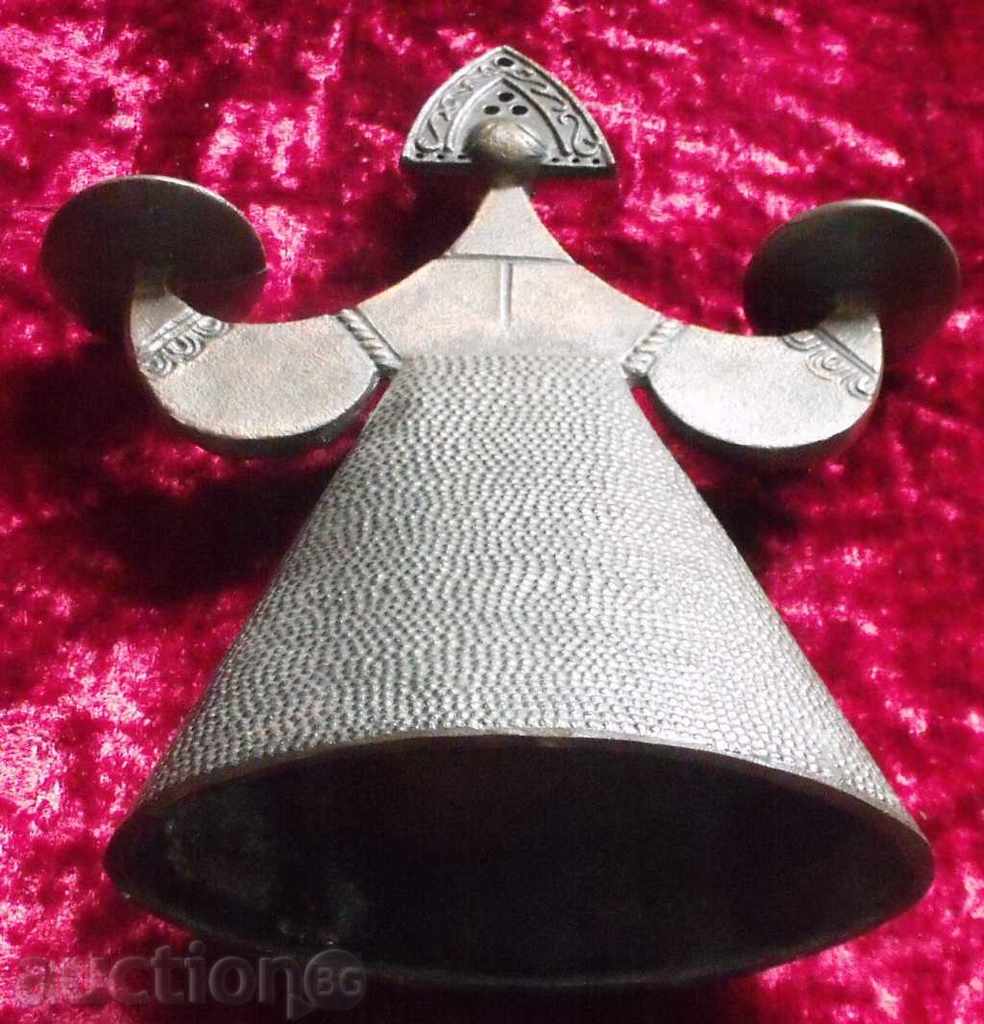 Auction an old metal candleholder Auction an old metal candleholder