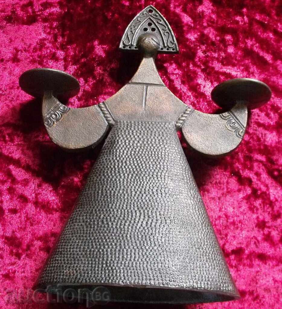 Delivery of an old metal candleholder Delivery of an old metal candleholder