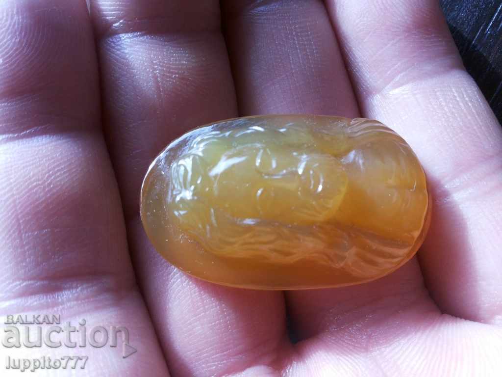 Delivery of camel, engraving on carnelian Delivery of camel, engraving on carnelian