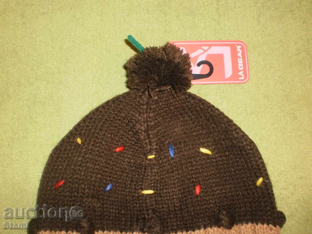 Delivery of Genuine children's La Gear hat in brown and white, reduced Delivery of Genuine children's La Gear hat in brown and white, reduced