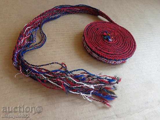 An old hand-knotted belt, belt, belt costume An old hand-knotted belt, belt, belt costume