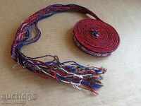 An old hand-knotted belt, belt, belt costume