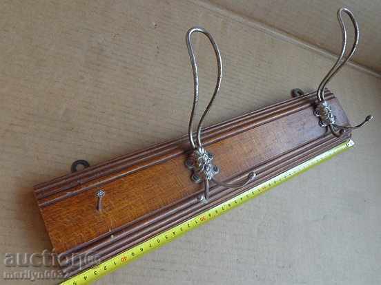 Auction An old bourgeois coat of walnut forged wrought iron Auction An old bourgeois coat of walnut forged wrought iron