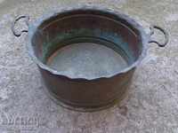An old copper pot, a bakery pan tray pan pan pot pan