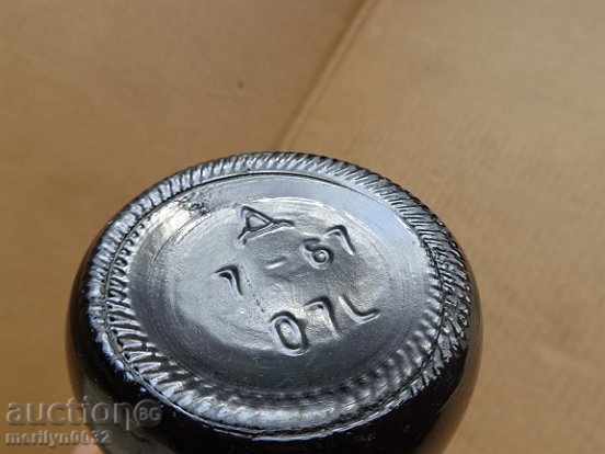 A bottle of red wine harvested by a juvenile UNPAIDED elixir - 5