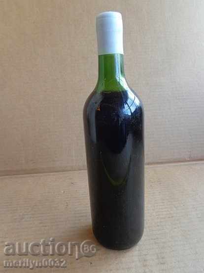 A bottle of red wine harvested by a juvenile UNPAIDED elixir - 7