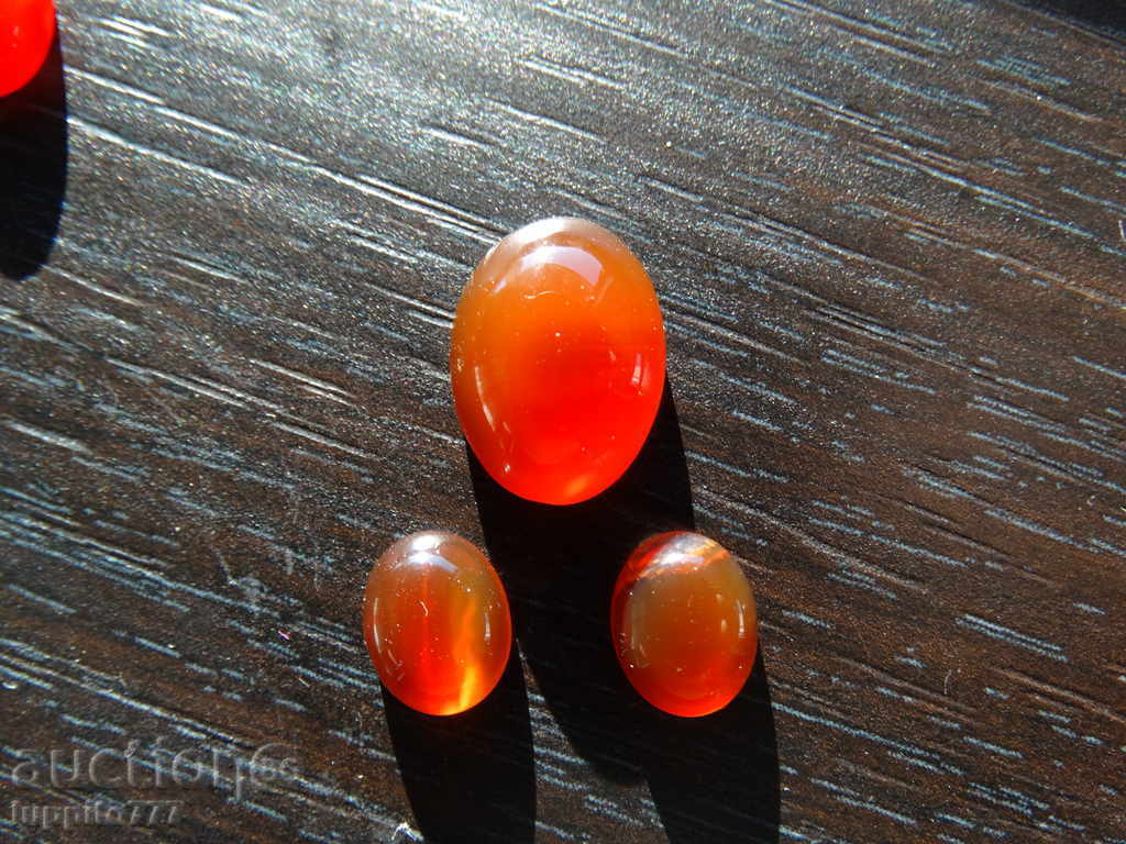 Auction natural chalcedon - 3 oval capoons Auction natural chalcedon - 3 oval capoons