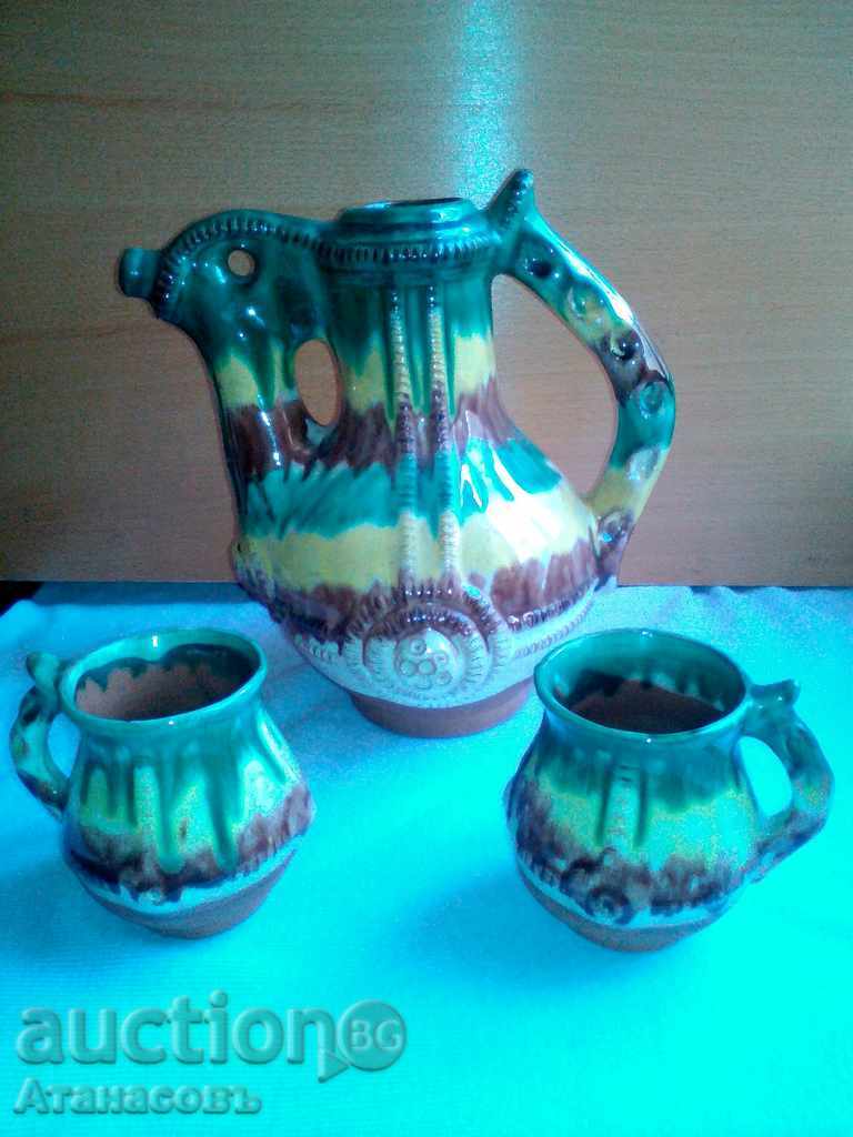 Beautiful pitcher with two cups and markings