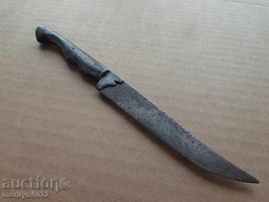 An old knife, a karaoke, a dagger, a blade