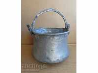 Tinned cauldron, old coin with inscription, copper vessel, coin