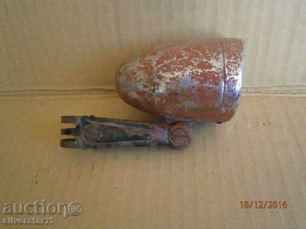 Auction  headlamp for an antique bicycle wheel