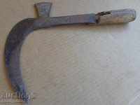 An old tool, an instrument, a hand forged cutter, a chopper, a machete