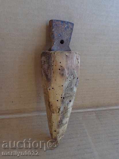 Ancient anvil for hair peeling Ancient anvil for hair peeling