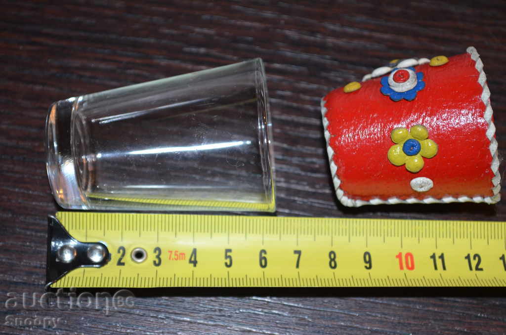 Auction Glass cup in a leather case Auction Glass cup in a leather case