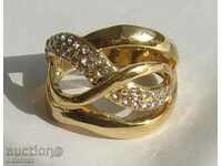 Ring of yellow metal with inlays