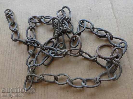 Delivery of Old forged chain with ring made of bronze hand-knit chain Delivery of Old forged chain with ring made of bronze hand-knit chain